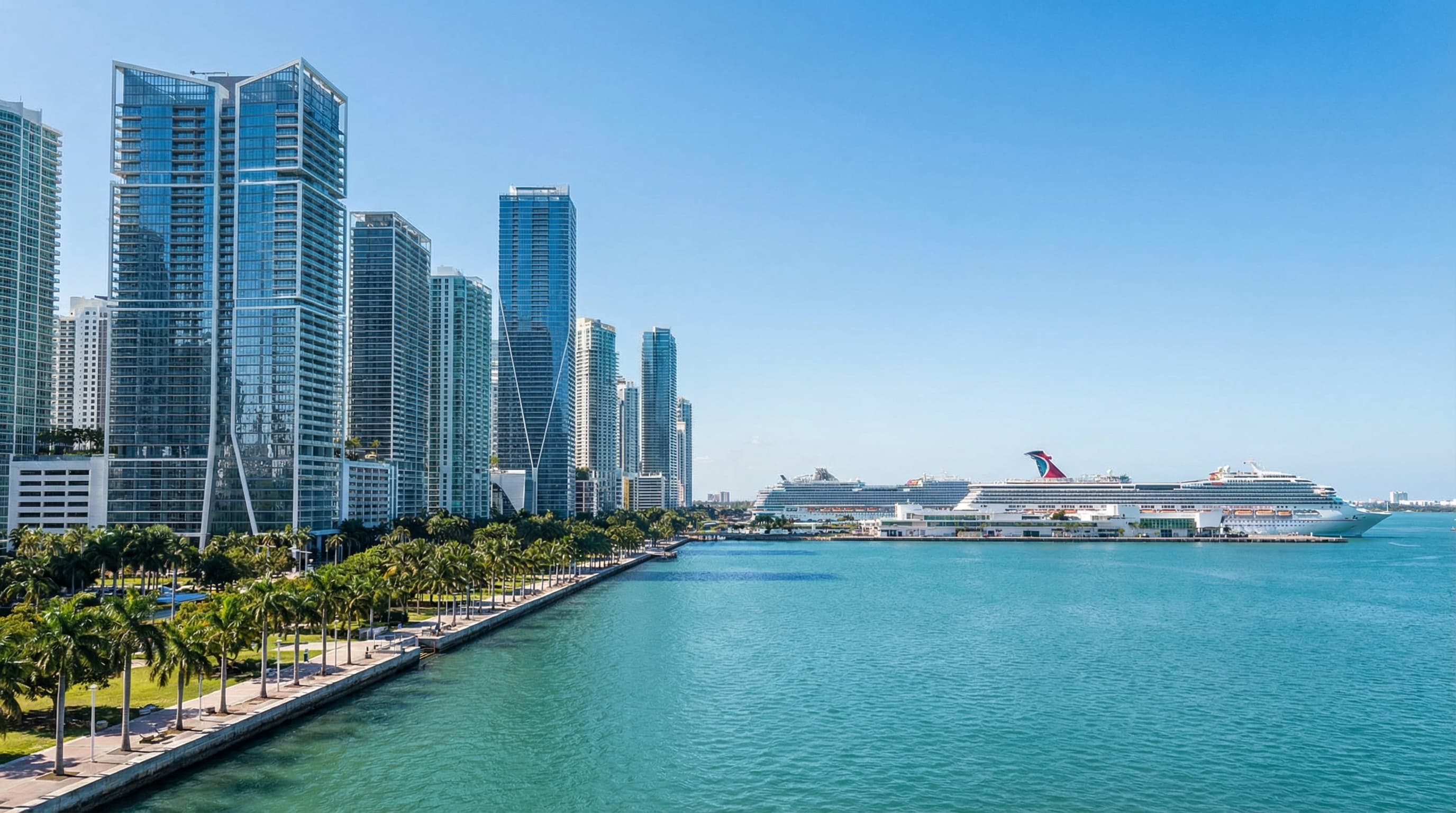 Miami Florida Brickell skyline with Biscayne Bay, downtown towers, and tropical waterfront at sunset